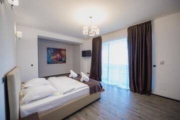 Фото номера Апартаменты Апарт-отели Silver Mountain Resort &amp; Spa г. Пояна-Брашов 3
