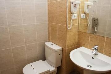 Фото номера Стандартный двухместный номер с 1 кроватью Отель Hotel Poiana Ursului г. Пояна-Брашов 9