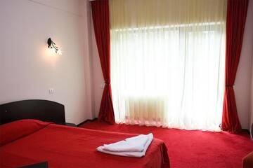 Фото номера Стандартный двухместный номер с 1 кроватью Отель Hotel Poiana Ursului г. Пояна-Брашов 12