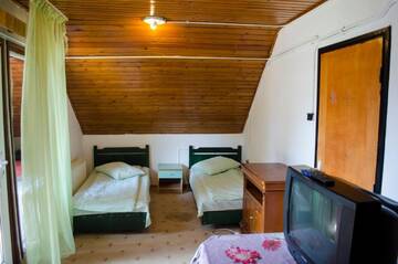 Фото номера Апартаменты с 2 спальнями Лоджи Cabana Fantanita cu Brazi г. Пояна-Брашов 4