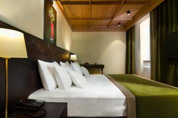 Фото номера Стандартный номер с кроватью размера &quot;queen-size&quot; Отель Ana Hotels Bradul Poiana Brasov г. Пояна-Брашов 5