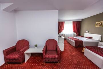 Фото номера Двухместный номер с 2 отдельными кроватями Отель Hotel Miraj г. Пояна-Брашов 8