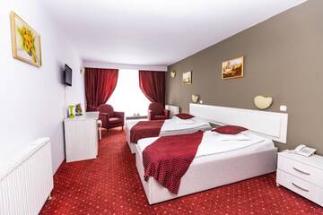 Фото номера Двухместный номер с 2 отдельными кроватями Отель Hotel Miraj г. Пояна-Брашов 11