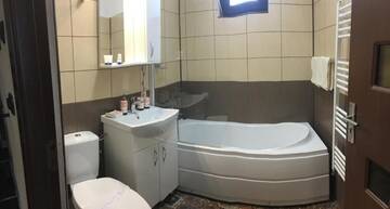 Фото номера Двухуровневые апартаменты Апарт-отели Vila 15 Complex Vila de Aur г. Пояна-Брашов 5