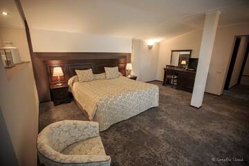 Фото номера Президентские апартаменты Курортные отели Alpin Resort Hotel г. Пояна-Брашов 3