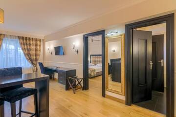 Фото номера Люкс с 1 спальней Отель Rizzo Boutique Hotel г. Пояна-Брашов 5