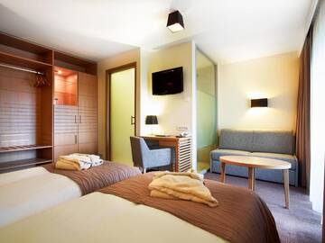 Фото номера Двухместный номер с 2 отдельными кроватями Отель Ana Hotels Sport Poiana Brasov г. Пояна-Брашов 5