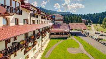 Фото номера Двухместный номер «Премиум» с 1 кроватью Отель Ana Hotels Sport Poiana Brasov г. Пояна-Брашов 4