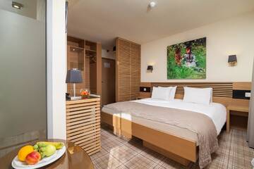 Фото номера Номер с кроватью размера «king-size» Отель Ana Hotels Sport Poiana Brasov г. Пояна-Брашов 3
