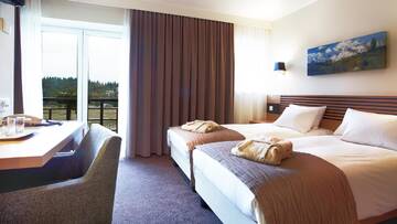 Фото номера Номер Summer Spa Choice с кроватью размера «king-size» или 2 отдельными кроватями Отель Ana Hotels Sport Poiana Brasov г. Пояна-Брашов 4